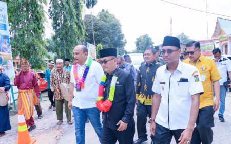 Pj Bupati Kampar Launching Program Kerja Keras Bebas Cemas BPJS Ketenagakerjaan